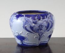A Moorcroft Macintyre Florian Poppy vase, c.1900, decorated in shades of blue with white slip