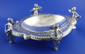 An ornate early 20th century WMF silver plated fruit bowl, of shaped oval form, with removable bowl
