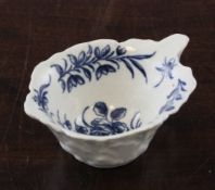 A Worcester leaf shaped and moulded butter boat, c.1760, the interior painted in underglaze blue