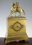 A 19th century French ormolu mantel clock, surmounted with medieval lovers beside a horse, silk