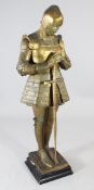 Margaret J. Wrightson (1877-1976). A gilded plaster figure of a crusader, on square plinth base,