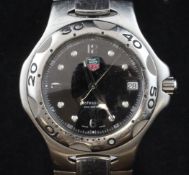 A gentleman`s stainless steel Tag Heuer Professional quartz wrist watch, with black dial, Arabic