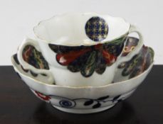 A Worcester `Old Japan Fan` pattern two handled chocolate cup and saucer, with pseudo Japanese mark