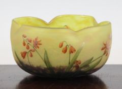 A Daum cameo glass bowl, c.1900, of quatrefoil shape, decorated with orange bell shaped flowers and