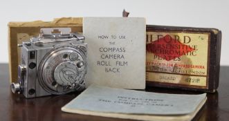 A rare Le Coultre compass Camera II, complete with original bill of receipt, instructions and other
