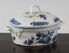 A Worcester ovular buttertub and cover, c.1770, printed in the `Three Flowers` pattern, with twig