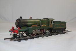 A Hornby O gauge Caerphilly Castle locomotive and tender, numbered 4073, in GWR green livery