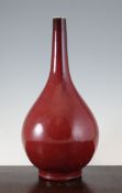 A Chinese sang de boeuf glazed bottle vase, Yongzheng seal mark but later, 41cm.