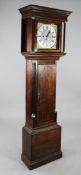 John Bell, Garstang. A George III oak thirty hour longcase clock, the 12 inch square brass dial