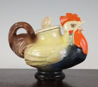 A Royal Doulton hen and chick teapot, early 20th century, the body modelled as the hen, the cover