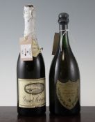 A Moet Chandon Dom Perignon bottle of champagne, Vintage 1955, together with a bottle of Grand