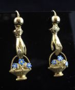 A pair of Victorian style gold rose cut diamond and enamel ""hand with basket of flowers"" drop