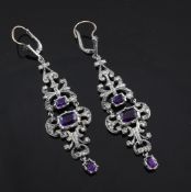 A pair of 19th century silver, amethyst and rose diamond set drop earrings, of pierced and scroll