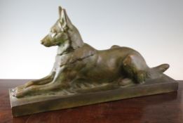 Masson. An Art Deco bronzed terracotta model of a seated hound, signed, 26in.