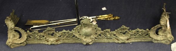 A 19th century French pierced bronze fire fender, with rocaille and scrolling decoration, 55in.