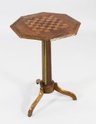A 19th century rosewood brass inlaid octagonal table, with chess board inlaid top, on tapering