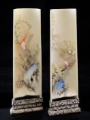 A pair of Chinese coloured ivory wrist rests, first half 20th century, each finely carved in open