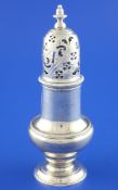 A George III silver baluster sugar caster, with turned finial and gadrooned borders, Samuel Wood,