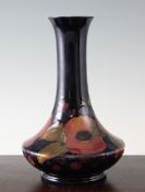 A Moorcroft Pomegranate bottle vase, c.1928, inscribed W Moorcroft mark and various impressed