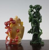 A Chinese spinach green jade figure of a lady and a chalcedony vase and cover, 20th century, the
