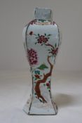 A Chinese famille rose hexagonal baluster vase, Qianlong period, painted with blossoming trees and