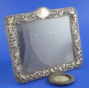 A late Victorian pierced silver mounted photograph frame by William Comyns, of rectangular form,