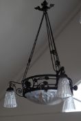 A Degue wrought iron and frosted glass light fitting, decorated with roses, 24in.