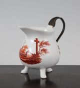 A German porcelain cream jug, probably Ansbach, late 18th century, painted in iron red with a