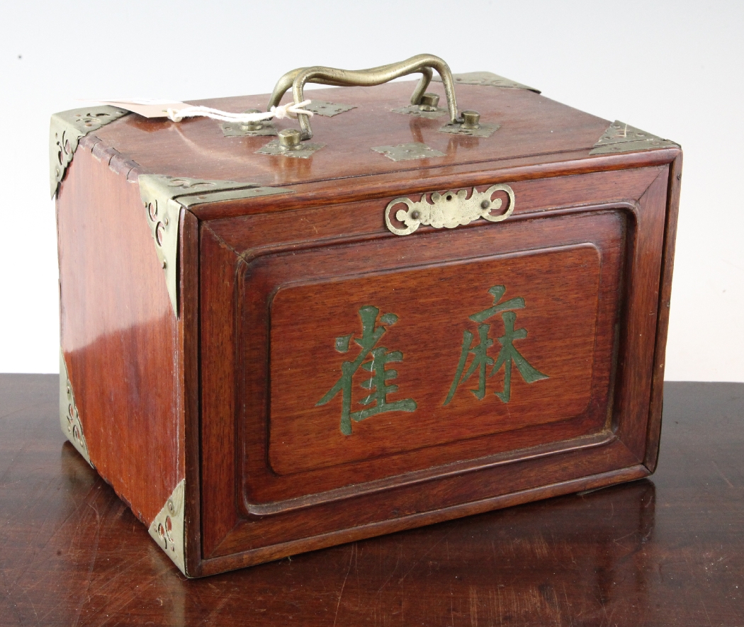 A Chinese bone Mah Jong set, housed in a brass mounted cabinet with five fitted drawers, 10in.