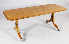 A William Tillman satinwood and crossbanded rectangular coffee table, with trestle ends and