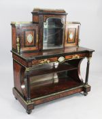 A Victorian ormolu mounted amboyna and ebonised bonheur de jour, the galleried superstructure with