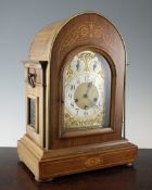 An Edwardian inlaid rosewood chiming mantel clock, with Junghans movement, 17.5in.