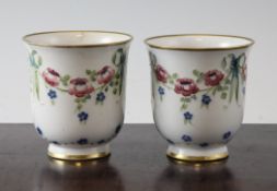 A pair of Moorcroft Macintyre `Eighteenth Century` beaker vases, c. 1908, inscribed `WM` and `W