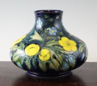 A Moorcroft Buttercup compressed baluster vase, c.1990, impressed marks, 6.5in.