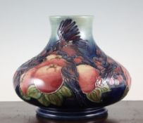 A Moorcroft Finches squat baluster vase, with pale to cobalt blue graduated ground, inscribed WM