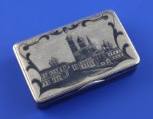A 19th century Russian 84 zolotnik silver and niello snuff box, decorated with townscape scenes,