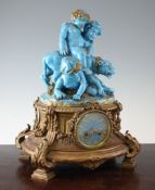 A 19th century French ormolu and porcelain mantel clock, the floral festooned base surmounted with