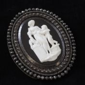 A 19th century glass paste cameo, in the manner of James Tassie, depicting a classical female and