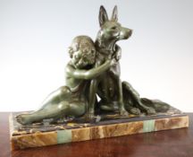 A. Godard. An Art Deco bronzed spelter and marble group of a girl cuddling an Alsatian, signed in