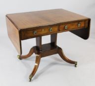 A Regency mahogany and rosewood crossbanded sofa table, with two drawers opposing two dummy