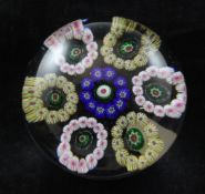 A Baccarat millefleur circular garlands paperweight, c.1850, with central rosette, 2.7in.