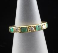 An 18ct gold, emerald and diamond half eternity ring, set with five emeralds and four diamonds,