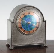 A Liberty Tudric pewter mantel timepiece, with blue and green enamelled inner dial and copper