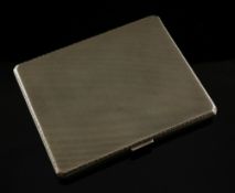 A George V engine turned 9ct gold cigarette case, of rectangular form with canted corners, maker,