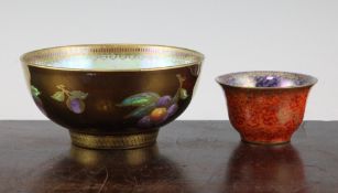 Two Wedgwood lustre small bowls, the first decorated with fruit on gold and turquoise grounds,