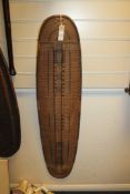 A Central African wicker shield, with rounded ends, 49.5in.