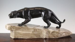 An Art Deco bronze figure of a panther, on marble base, signed J.Brault, 22in.