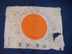 A WWII Japanese silk prayer flag, together with a Japanese pilot`s flying log book and an oak