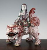 A Japanese Kutani figural incense burner, 19th century, modelled as bodhisattva riding a shi-shi,