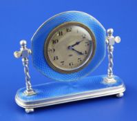 A 1920`s silver and blue guilloche enamel swivelling boudoir timepiece, with Arabic dial and 8-day